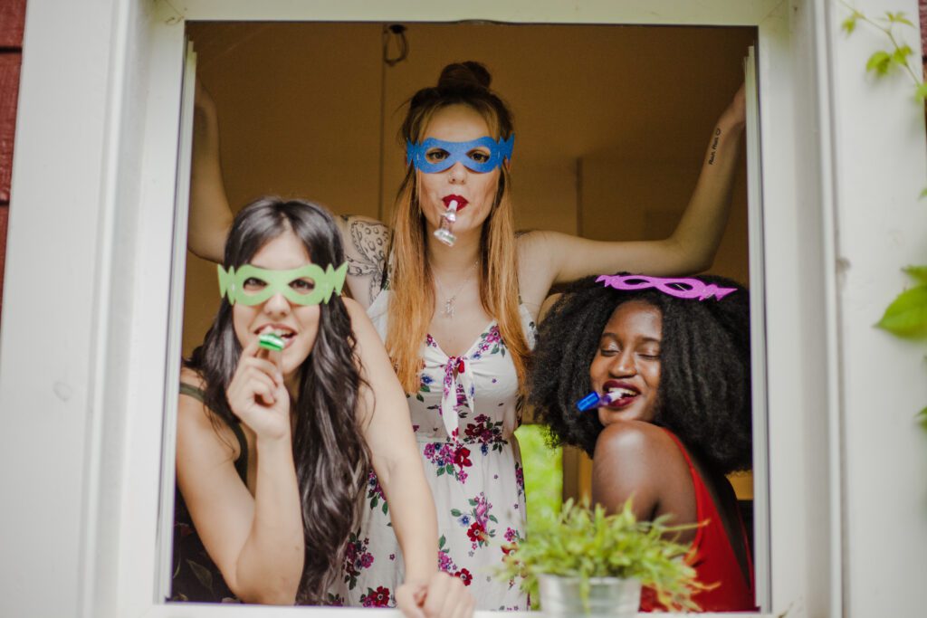 Fun Photo Booth Rhode Island – Add Excitement to Your Next Event Guests enjoying a fun photo booth in Rhode Island with vibrant props and instant photo sharing.